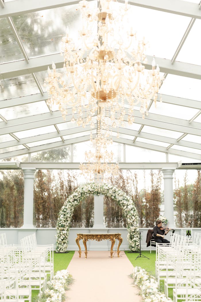journey A luxurious wedding setup with floral decorations and chandeliers, perfect for a romantic ceremony in São Paulo.